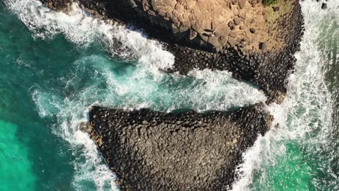 Top Down Aerial Of Basalt Rocks And Surf, Fingal Head NSW Видео 347040965