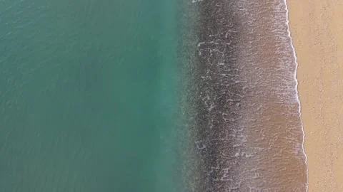 Top Down Aerial Beach Coastline with Waves and Sand Texture Stock Footage 327840468