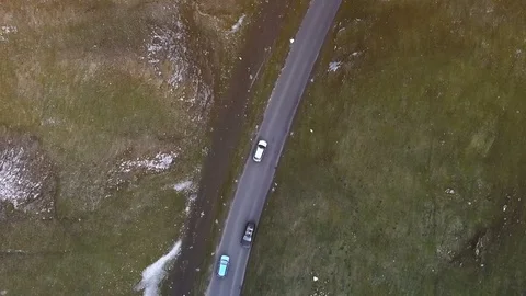 Top down aerial car tracking shot on beautiful country road v2 Stock Footage 105310355