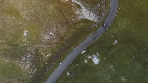 Top down aerial car tracking shot on beautiful country road v4 Stock Footage 105310523
