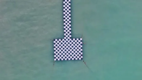 Top down aerial checkered pier at tropical resort Phuket Thailand Video stock 331478717