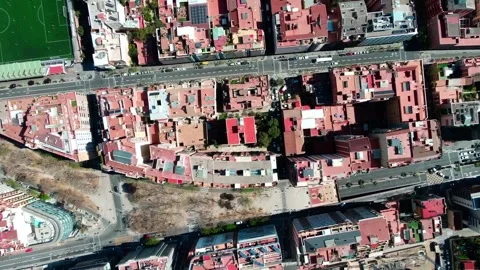 Top down aerial cityscape view of Barcelona and the sea on a sunny summer d.. 動画素材 244703297