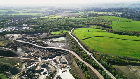 Top down aerial clip of a large open cast mine, quarry. Stockbeeldmateriaal 236163343