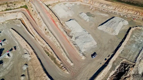 Top down aerial clip of a large open cast mine, quarry. Видео 236163570