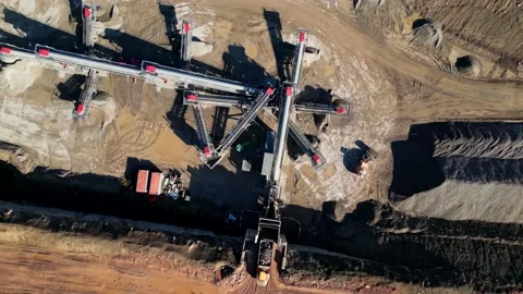 Top down aerial clip of a large open cast mine, quarry. Stockbeeldmateriaal 236163595