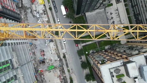 Top Down Aerial of Construction Site with Crane in Montreal – 4K Stock Footage 332626415