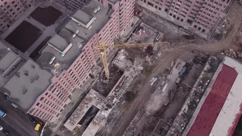 Top down aerial crane view at a construction site 動画素材 324704117