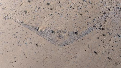 Top Down Aerial Desert Surface Rock Formation Crescent Pattern Morocco 스톡 사진