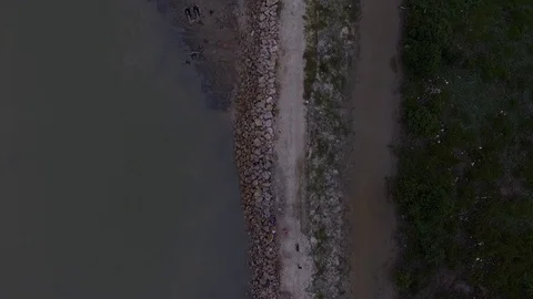 Top Down Aerial Drone Footage Half Water and Land at Remis Beach at Selangor HD Stock Footage 107923882