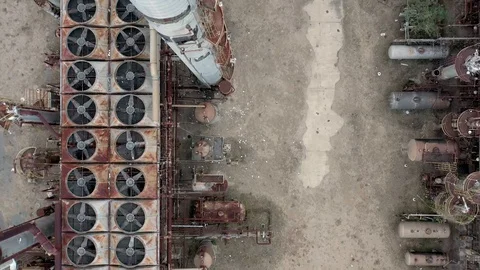 Top-down aerial drone shot of oil crisis devastated abandoned petrol gasoline Stock-Footage 128188045