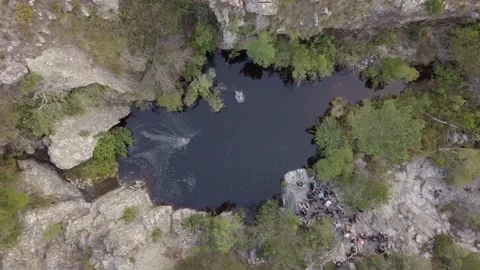 Top-down aerial drone shot jumping into lake, South Africa Stockbeeldmateriaal 157311397