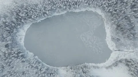 Top Down Aerial Drone Shot Of A Frozen Lake In Winter Stock Footage 238087100