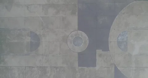 Top-down aerial drone shot of a basketball court. Stockbeeldmateriaal 330156420
