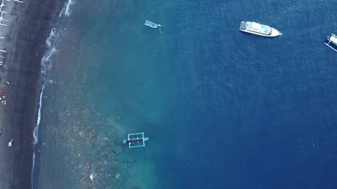 Top Down Aerial Drone Shot Moving Forward Along Shoreline with Boats Stock-Footage 333554736