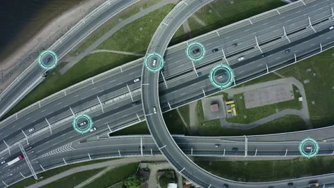 Top down aerial drone view of autonomous self driving cars moving through city Stock-Footage 135782016