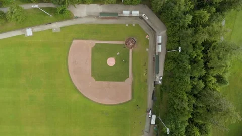 A top down aerial drone view of a green baseball field, baseball diamond, sports Видео 204101234