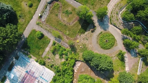 Top down aerial drone view of abandoned amusement park Spreepark Berlin 스톡 동영상 243814823