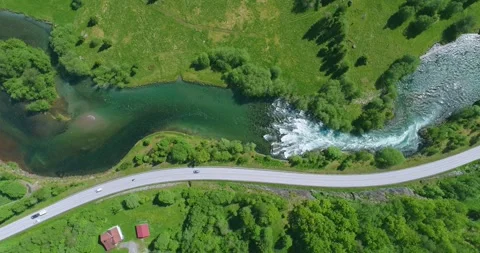 Top Down Aerial Drone View of a River Snaking through a town in Norway (Stryn) Stock Footage 247378198