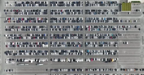 Top down aerial drone view on a large car park. 스톡 동영상 247578919