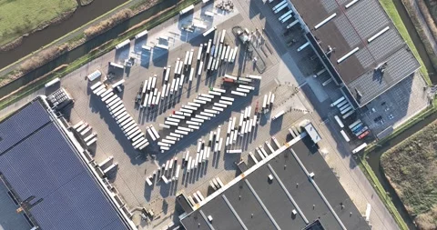 Top down aerial drone view on a supermarket distribution center. Logistics Stock Footage 259692951