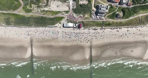 Top down aerial drone view on sandy summer beach in Zeeland, The Netherlands. Stock Footage 282693346