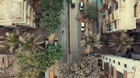 Top-Down Aerial Drone View of City Road with Moving Traffic – Urban Stock Footage 308092548