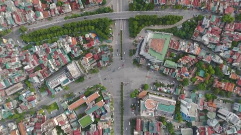 A top-down aerial drone view of a bustling urban intersection in Hanoi, Vietnam. Stock Footage 315695686