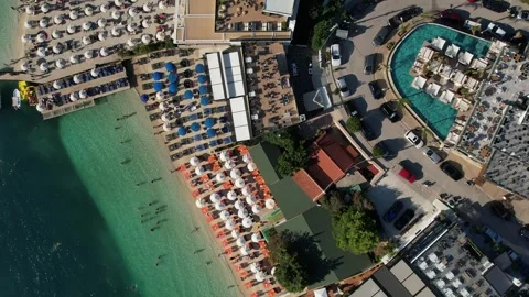 Top Down Aerial Drone View of Colorful Beach Umbrellas in Ksamil, Albania Stock Footage 316763992