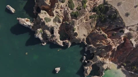 Top-down aerial drone view of Kayaking Adventureh in Lagos, Algarve Portugal Video stock 329226567