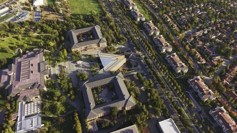 Top-down aerial drone view descending towards the modern courtyards of Stock Footage 332561408