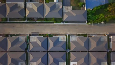 Top down aerial drone view of symmetrical suburban houses and roofs 스톡 동영상 333626521