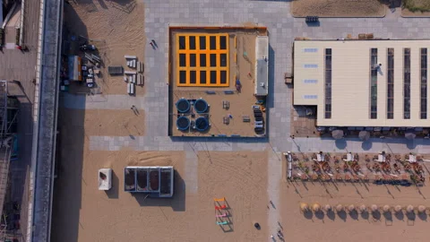 Top-down aerial drone view of a beach recreation area featuring outdoor Stock Footage 337911033