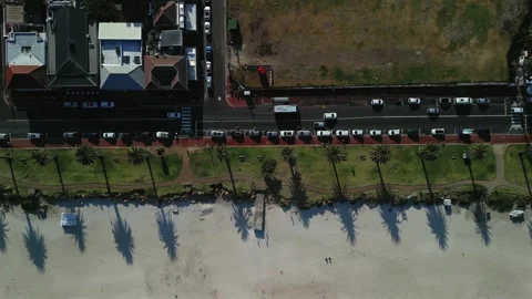 Top-Down Aerial Drone View of Camps Bay Promenade, Beach and Street, Cape Town Video stock 343464431