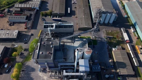 Top-down aerial drone view of a modern energy recovery facility and industrial Stock Footage 346653226