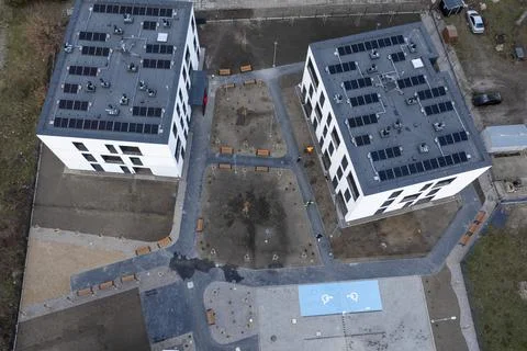 Top Down Aerial Drone View of Modern Residential Complex with Solar Panels Stock Photos