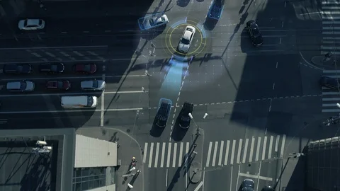 Top Down Aerial Drone: White Autonomous Self Driving Car Moving Through City. Stock Footage 100629183