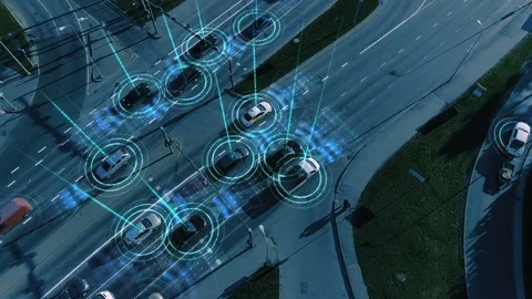 Top Down Aerial Drone: White Autonomous Self Driving Car Moving Through City. Stock Footage 100630123