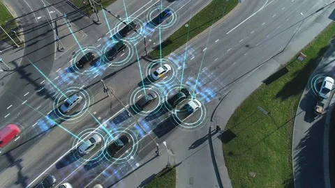 Top Down Aerial Drone: White Autonomous Self Driving Car Moving Through City. Vídeos de archivo 100631142