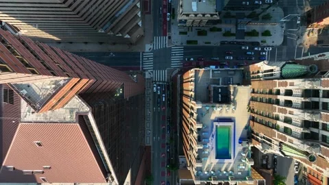 Top down aerial of empty city street in metropolitan downtown city. Stock Footage 198991933