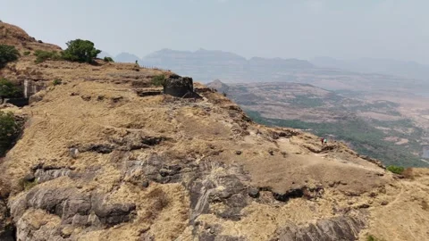 Top down aerial of eroded cliffs at Ratangad Maharashtra India Stock Footage 341127026