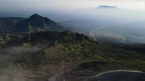 Top-Down Aerial Flight Along Volcanic Cliff at Mount Ijen, East Java Stock Footage 260043161