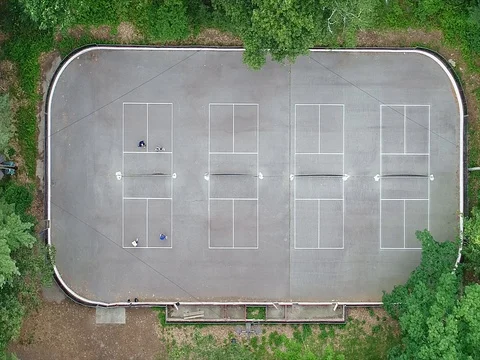 Top Down Aerial Footage of an Active Pickleball Game Stock Footage 77109207
