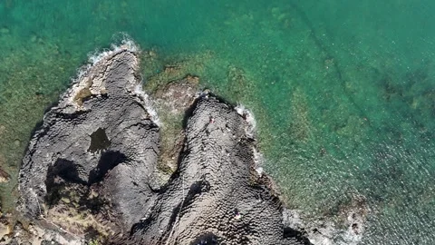 Top-down aerial of Ganh Da Dia (Da Dia Reef), Dak Lak (Phu Yen), Vietnam Stock Footage 339406608