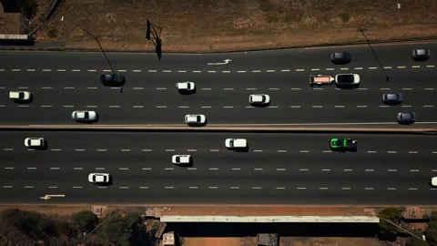 Top down aerial of highway traffic with cars and trucks Stock Footage 332299684