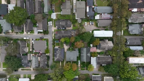 Top down aerial of homes in Deep South USA. Southern United States rooftop Video stock 225645617