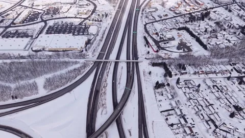 Top down aerial infrastructure geometry with snowy road network Stock Footage 328963176