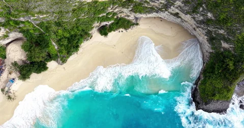 Top Down Aerial of Kelingking Beach Turquoise Waves and Sandy Cove, Nusa Penida Stock Footage 331213837