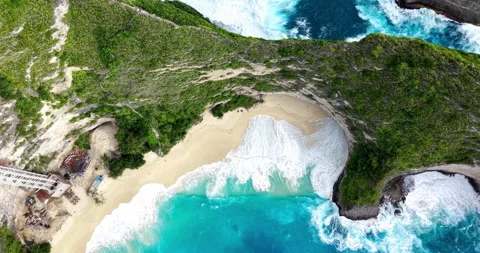 Top Down Aerial of Kelingking Beach Cove with Cliff Elevator Construction, Nusa Stock Footage 331213845
