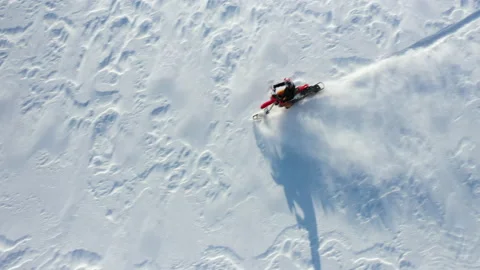 Top down aerial of man riding timbersled Stock Footage 151045926