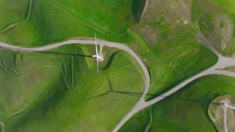 Top down aerial nature landscape view with wind turbines generating green energy Stock Footage 185867619